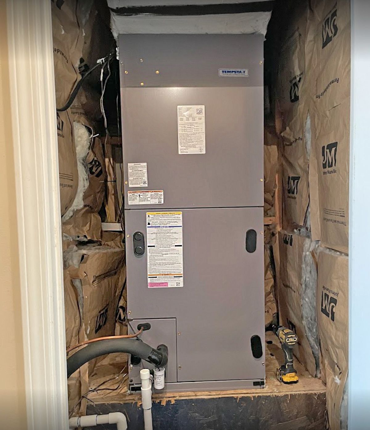 New air handler installed in a closet, fresh drain line