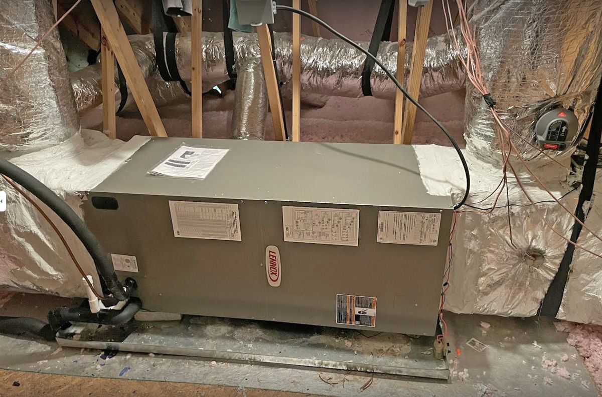 Horizontal furnace or air handler set in an attic with ductwork