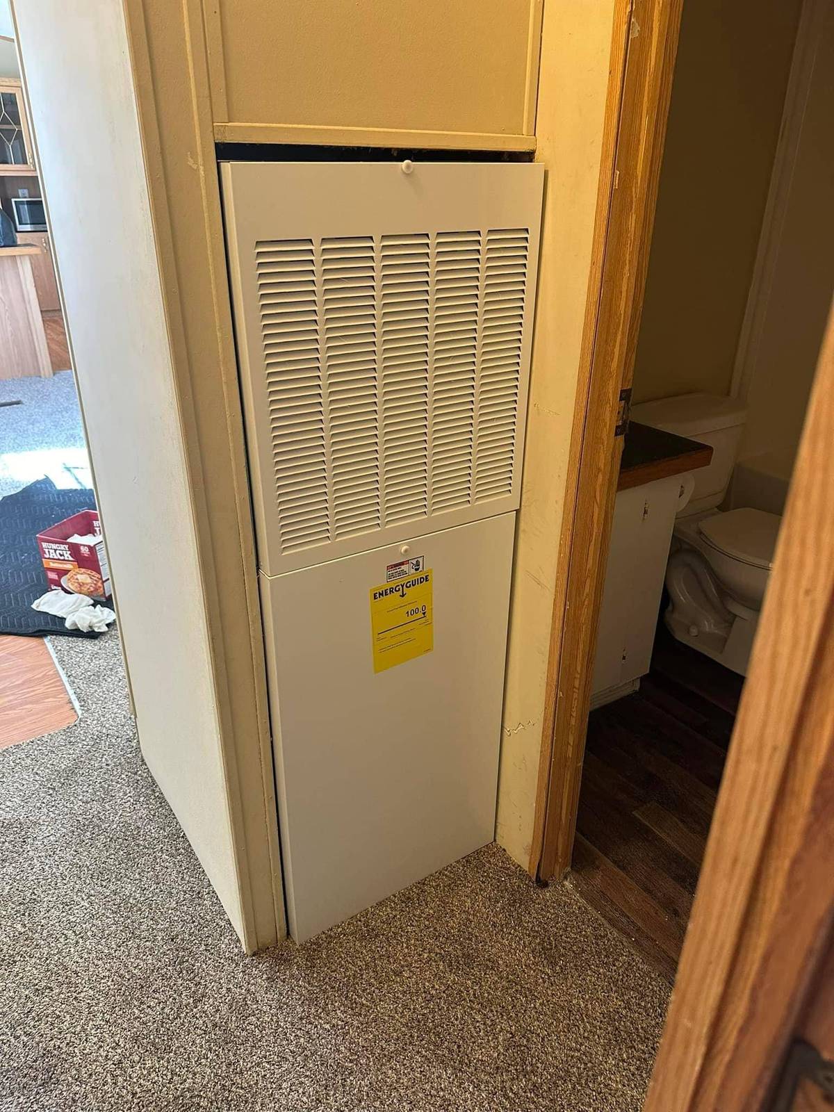 Furnace in a closet with louvered door